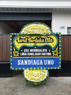 Papan Bunga Duka di Pinaesaan